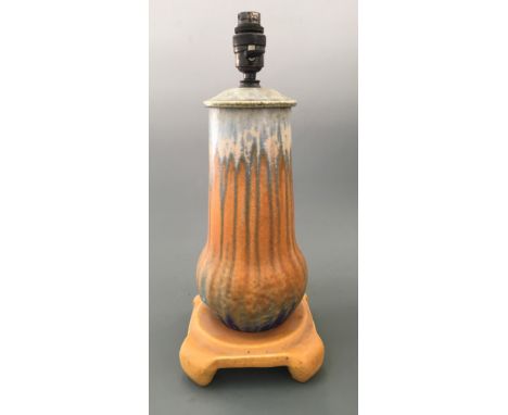 A Ruskin orange and blue design lamp base, height 43cm.