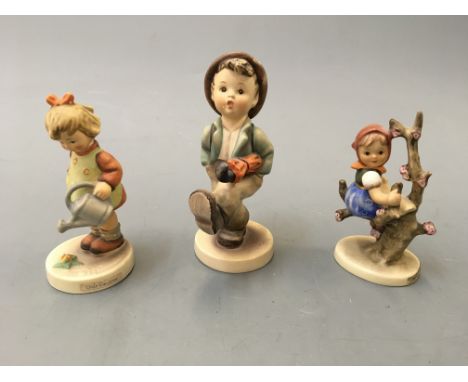 Seven Goebel figurines with one other similar example.