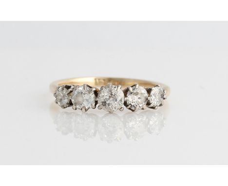 A five stone diamond ring, set with five graduated old cut diamonds, total diamond weight approx. 1ct, indistinctly stamped, 