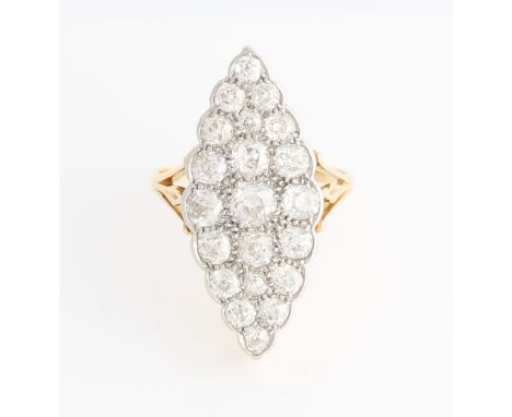 A diamond cluster ring, the navette shaped head set with 21 old cut diamond of varying sizes, total diamond weight approx. 1.