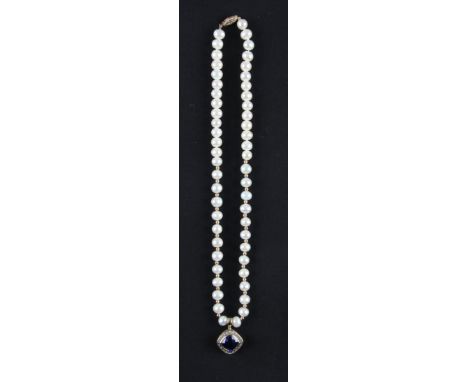 A string of pearls suspending a sapphire and diamond pendant, the string of pearls consisting of 53 pearls partly strung with