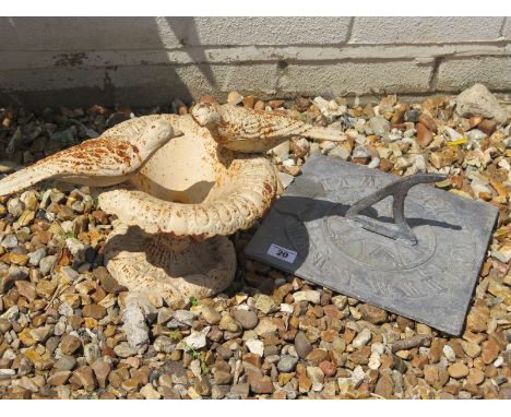 A cast iron bird bath with two perching birds, 38cm wide, 22cm H, together with a square lead sundial with crest, 25cm square