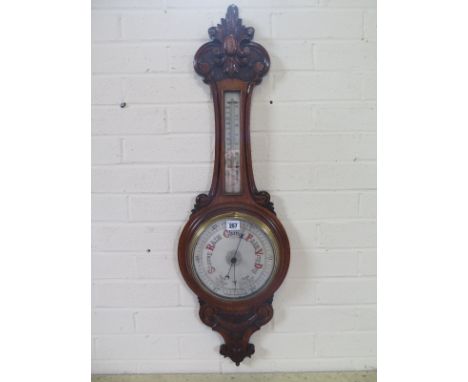 An oak case barometer/thermometer - approx 89cm high 