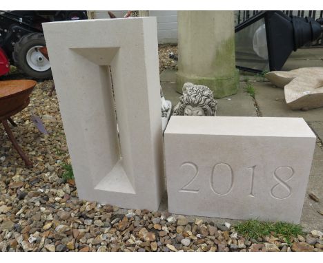 A hand carved limestone 2018 date stone an arrow slit window - window 44cm H x 21cm 