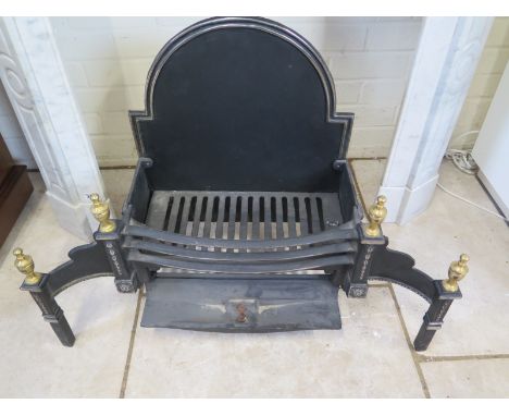 A cast iron fire grate with back and brass finials - 60cm Tall - 80cm wide - 28cm Deep 