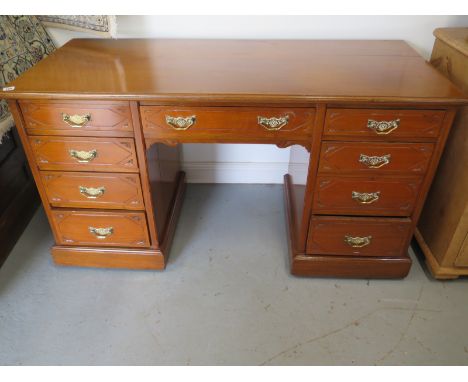 A 19th Century walnut nine drawer desk or dressing table - 137cm W x 60cm D - 75cm H 