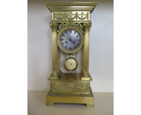A large early 19th Century ormolu portico clock by Henri Robert, Paris - 56cm H, 27cm W, some general wear. movement requires