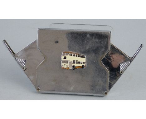 A chrome plated cigarette case, of oblong form with hinged pull out cigarette holders to either end and applied enamel double