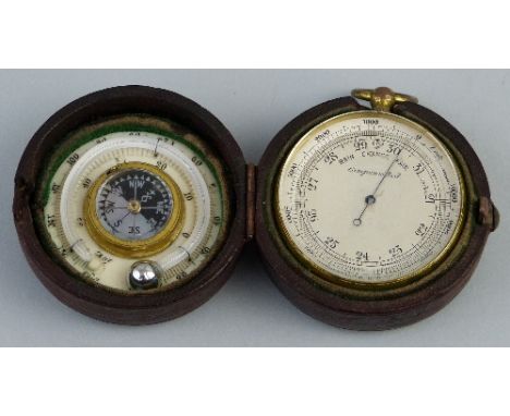 A pocket combined barometer, compass and thermometer, in hinged circular case, the base containing a gilt brass cased compens