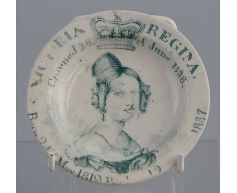 A 19th Century pearlware Queen Victoria coronation commemorative nursery plate, transfer printed in green with a named and da