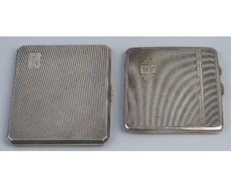A presentation cigarette case, of square form with monogrammed cartouche on engine turned ground, hinged to reveal inscriptio