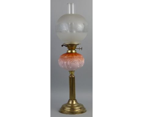 A table oil lamp, with brass stepped circular base, fluted column, moulded and shaded opaque glass reservoir, duplex burner, 