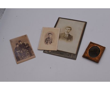 A photograph of three gentlemen, by J.G Tunny (Edinburgh), an ambrotype of a young boy, possibly Prince Albert; and two other