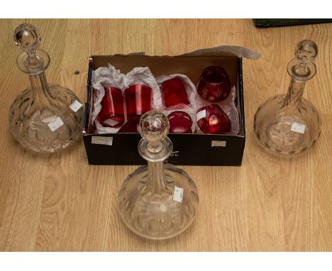 Three cranberry tumblers, three cut glass cranberry glasses, a ruby glass goblet with knopped stem and three cut glass decant