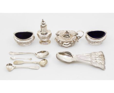 An Edwardian silver condiment set to include: pair of oval salts, pepper pot, mustard pot and cover, each with band of repous