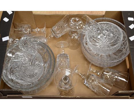 A collection of crystal and cut glass wares, including bowls and spirit glasses