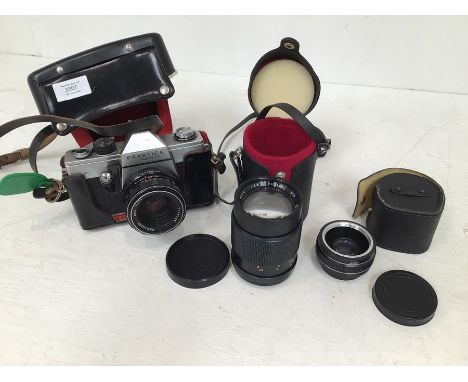 Vintage Praktica cased camera and lenses.