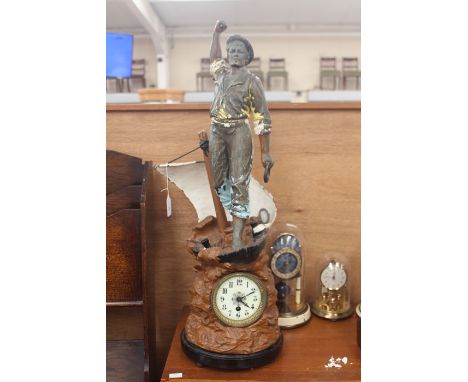 Early 20th century French Spector table top clock depicting a fisherman AF.