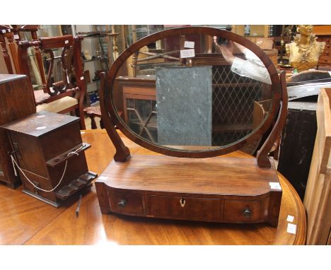 A 19th Century mahogany dressing table mirror, fitted with three drawers, standing on bracket feet, 52cm wide