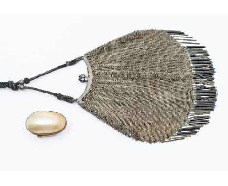 A late Victorian white metal chain mail purse, with cabochon stones set to the clasp, black and chain beaded fringing with bl