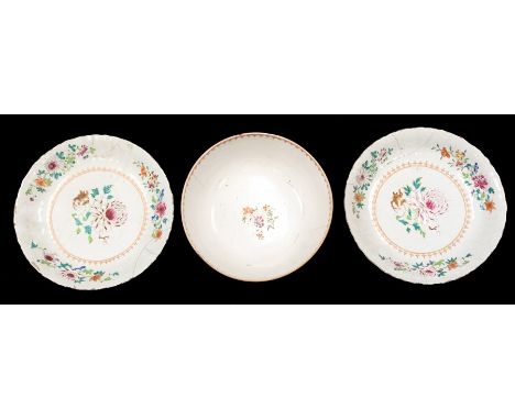 Qianlong (1711-1799), a pair of of famille rose chargers, approx 32cm diam; together with a similar punch bowl, approx 29cm d