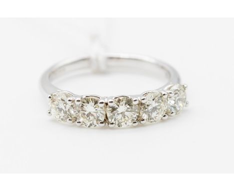 A five stone diamond and 18ct white gold ring, comprising a row of claw set round brilliant cut diamonds, total diamond weigh