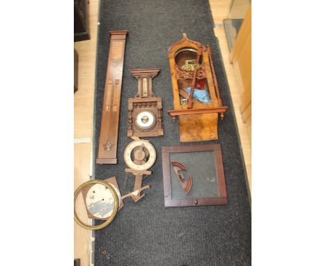 A collection of Assorted Clock parts for spares &amp; repairs, comprising a 1919 Rosewood Veneered Barometer (A/F), A 19th ce