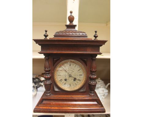 A German oak bracket clock, eight day movement, made by 'Lenzkirch' no. 484161, spring driven movement, striking on a gong, p