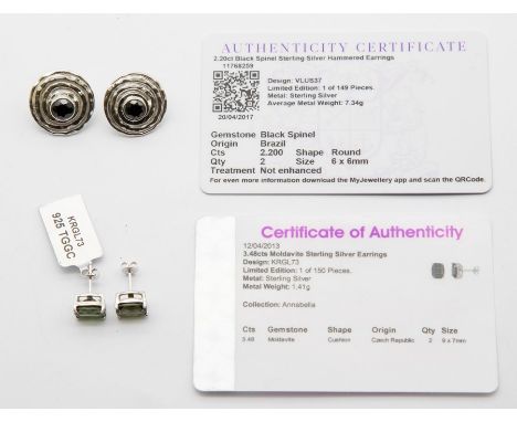 A pair of silver and black&nbsp;spinel earrings, circular textured silver set to the centre with round cut spinel, diameter a