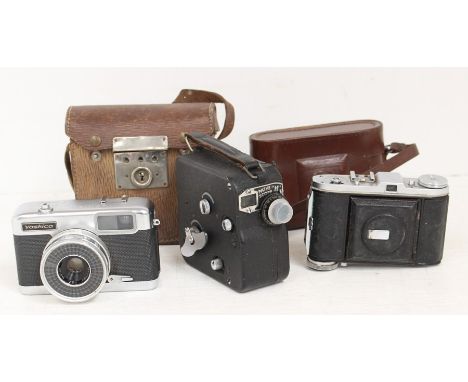 &nbsp;Three mid 20th Century vintage cameras including Baldas Yashica ET - Matic and A Pathe Scope