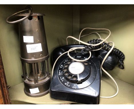 An Eccles type 6 Miner's lamp together with a vintage black plastic phone (2)&nbsp;