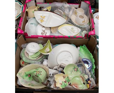 A collection of mid 20th Century Carltonware to include serving dishes, plates, candlesticks, jugs, teaware, various designs 