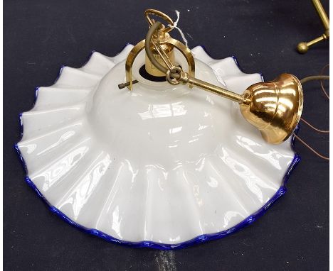 Two light fittings, one brass and one glass