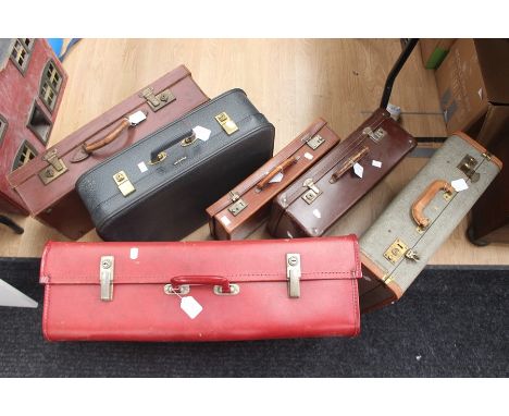 A collection of five various vintage suitcases and a leather briefcase, graduating sizes (6)&nbsp;