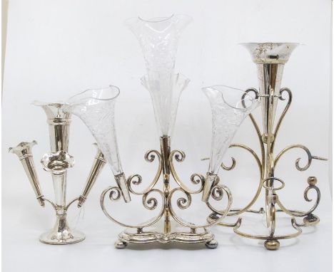 An early 20th Century sterling silver epergne, hallmarked rubbed, filled together with two silver plate mounted epergnes, one