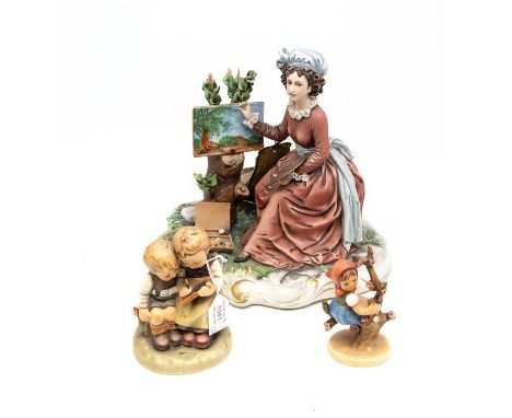 A limited edition Capo-di-monte figure of an Artist seated after the design by Bruno Merli together with a two Goebel figures