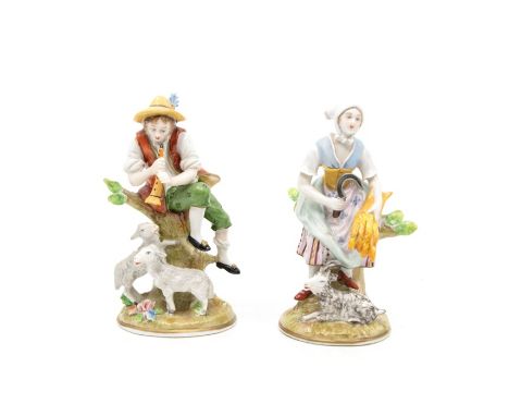 A pair of Continental 19th Century porcelain figures modelled as Lady cutting wheat with a sythe, with a goat at her feet and