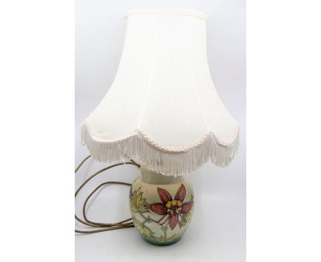 Mid to late 20th century Moorcroft table lamp with shade.