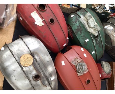 A collection of five vintage BSA motorcycle fuel tanks and other parts, circa 1950s&nbsp;