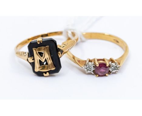 An antique gold Memorial ring with onyx  and applied gold M, unmarked yellow metal, size K1/2 and an 9ct ruby and diamond rin