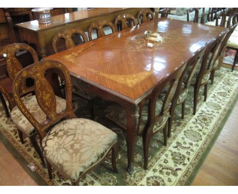 A GOOD ITLIAN WALNUT AND MARQUETRY DINING ROOM SUITE comprising a rectangular table with gilt mounts 218cm x 102cm together w