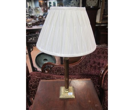 A CORINTHIAN COLUMN BRASS TABLE LAMP with pleated shade