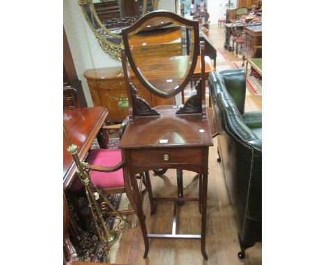 AN EDWARDIAN MAHOGANY DRESSING TABLE with heart shaped dressing mirror