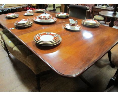 A GOOD GEORGIAN STYLE MAHOGANY TWO POD TABLE the rectangular top with rounded corners and one loose raised on twin tripod sup