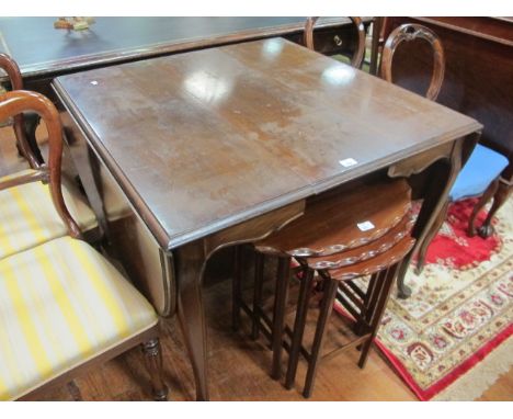 A TEAK DROP LEAF DINING TABLE on carved cabriole legs 99cm x 100cm