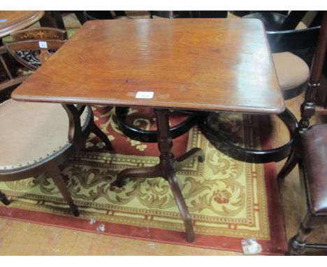 A GEORGIAN MAHOGANY RECTANGULAR OCCASIONAL TABLE on pillar support