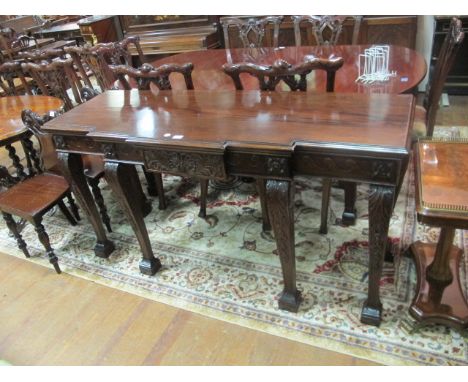 A GOOD GEORGIAN STYLE MAHOGANY BREAKFRONT SIDE TABLE with carved frieze and leaf carved cabriole legs 165cm wide