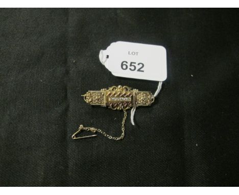 A VICTORIAN 15CT GOLD DIAMOND AND RUBY BAR BROOCH