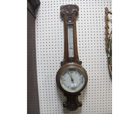 A LATE VICTORIAN OAK CASED BANJO BAROMETER with thermometer