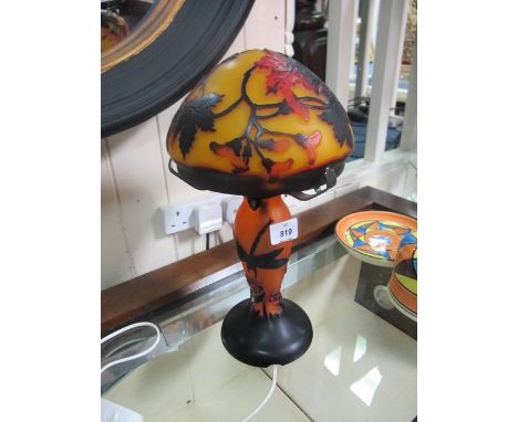 A GALLEY STYLE EMBOSSED AMBER TABLE LAMP together with shade 79cm high